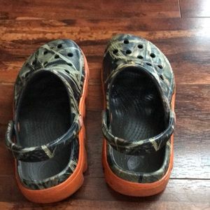 camo crocs with orange sole